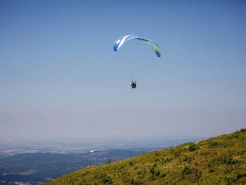 Paragliding above the Pyrenees with spectacular mountain scenery